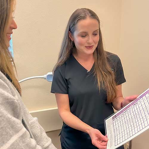 Patient and Dr. Kirchner reviewing chart.